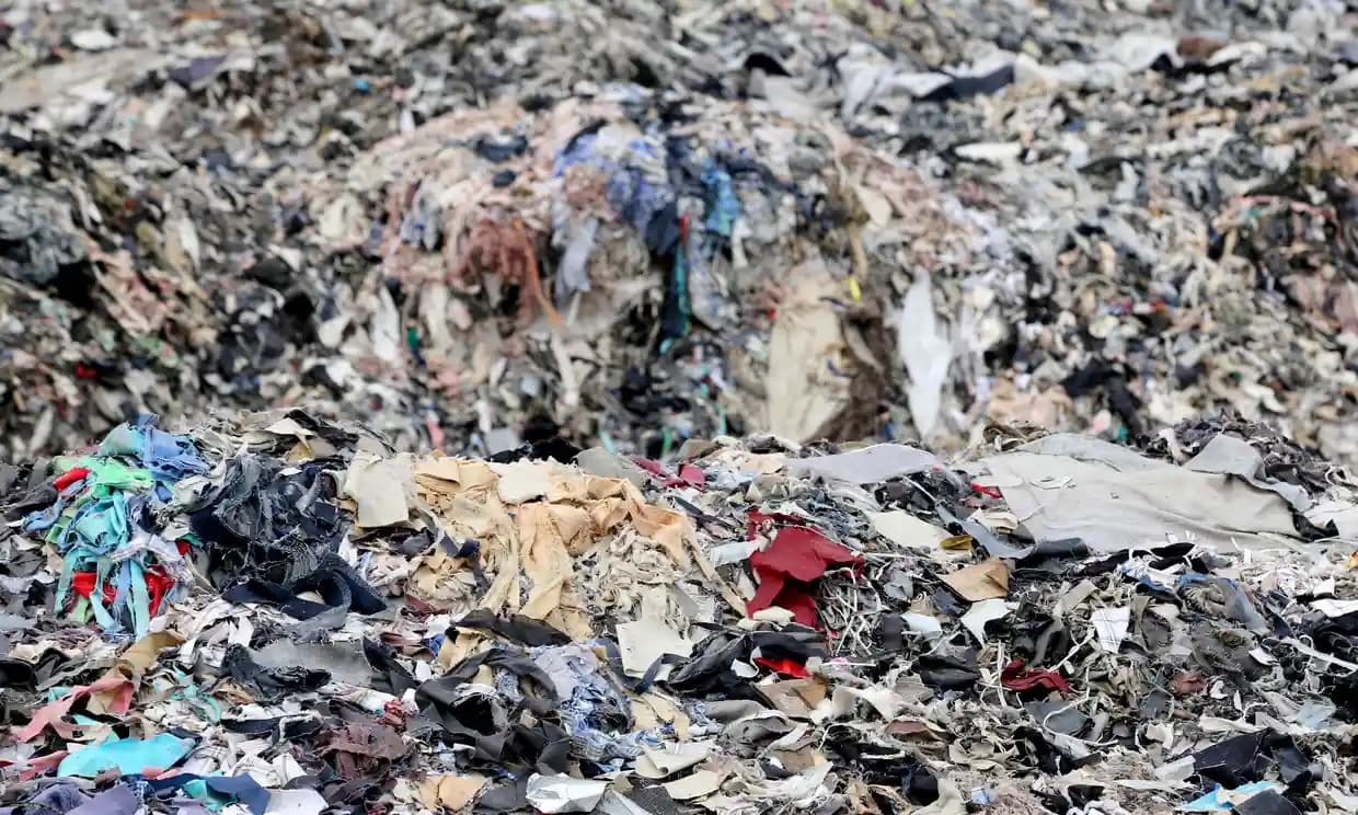 textile scrapyard in bangladesh, c:o the guardian.jpg